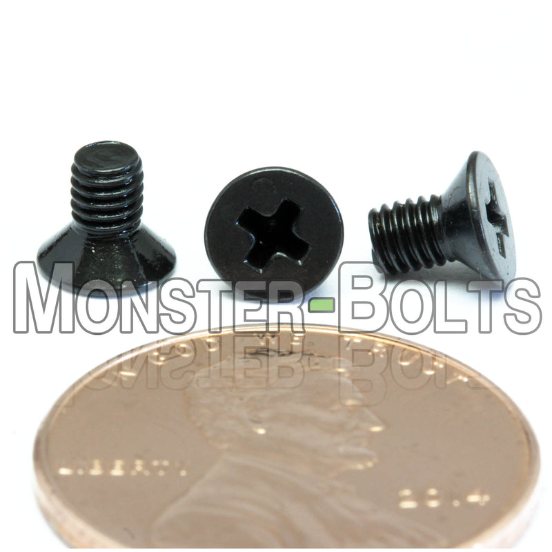 Black M3-0.50 x 5mm Phillips Flat Head machine screws with white background