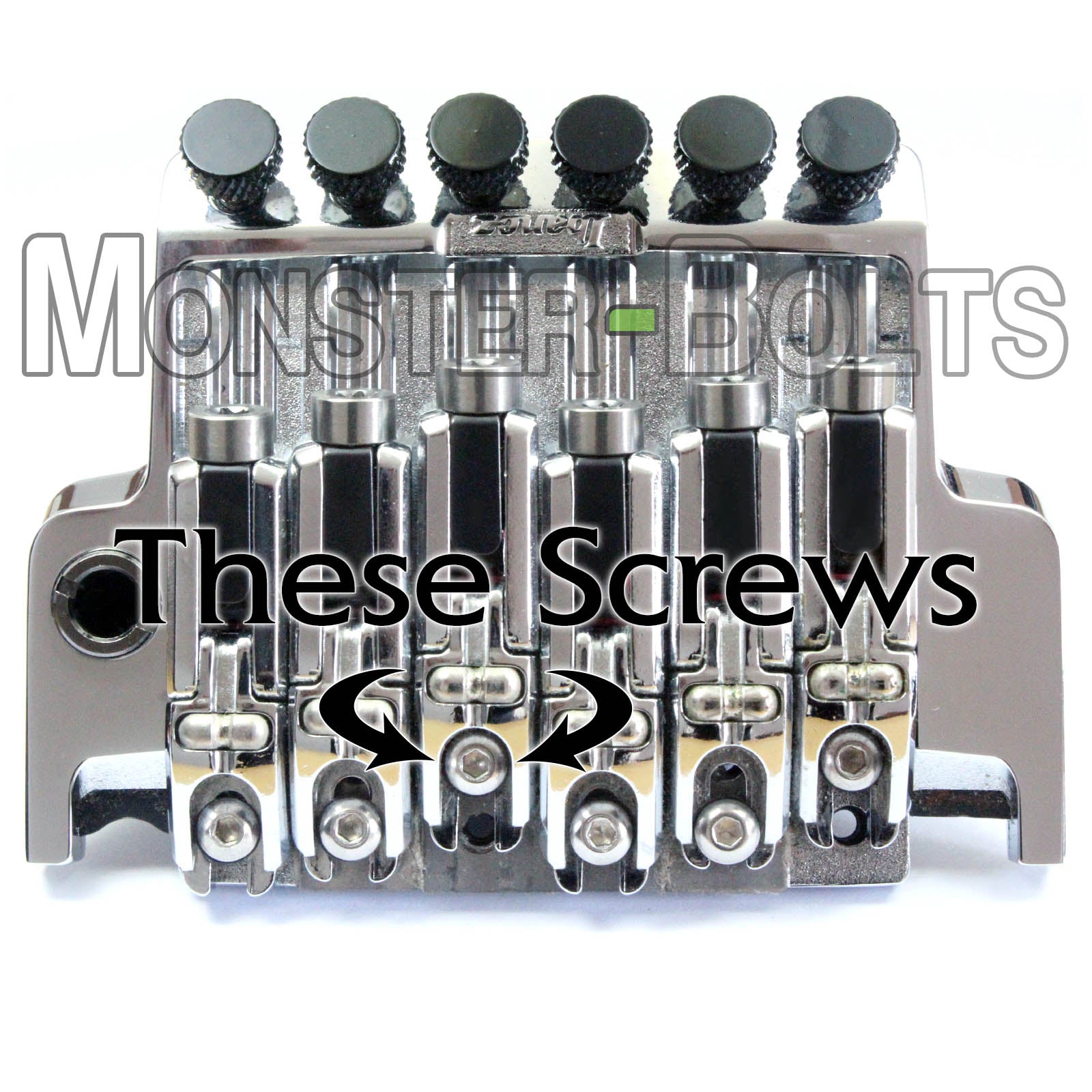Ibanez edge Pro tremolo shown with titanium saddle intonation screws.