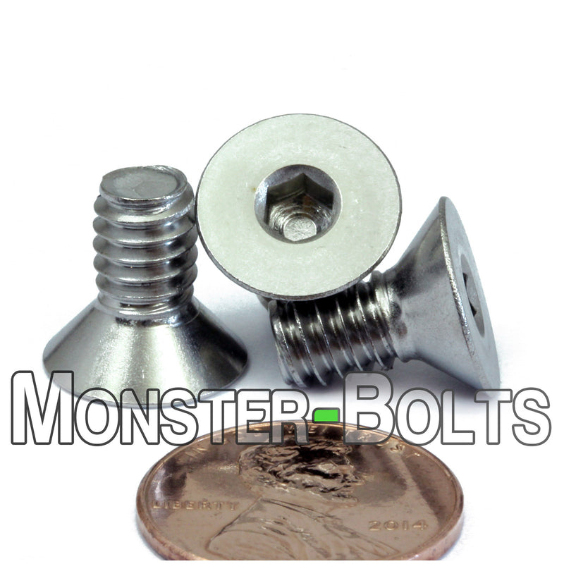 Countersunk Stainless Steel 1/4-20 x 1/2" flat head socket screws, with US penny for size.