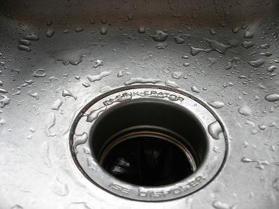 How to fix jammed garbage disposal