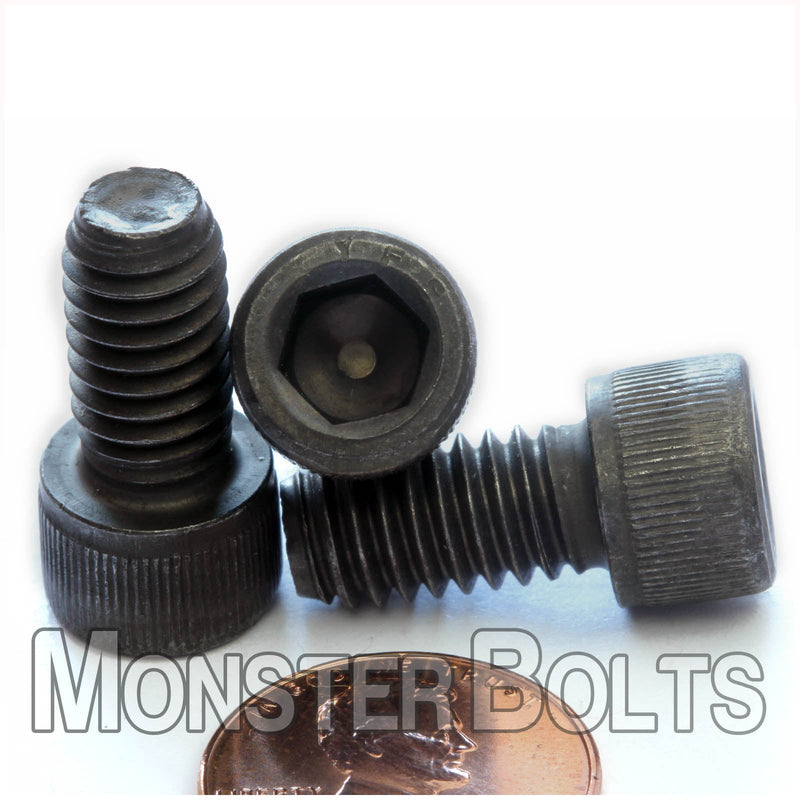 5/16"-18 x 5/8" Socket Cap screw, alloy steel with black oxide finish. Shown with US penny for screw size.