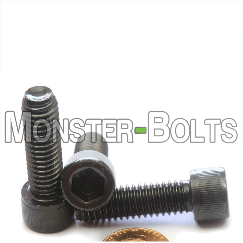 7/16"-14 x 1-1/4" Socket Head Cap screw, alloy steel with black oxide finish. Shown with US penny size comparison.