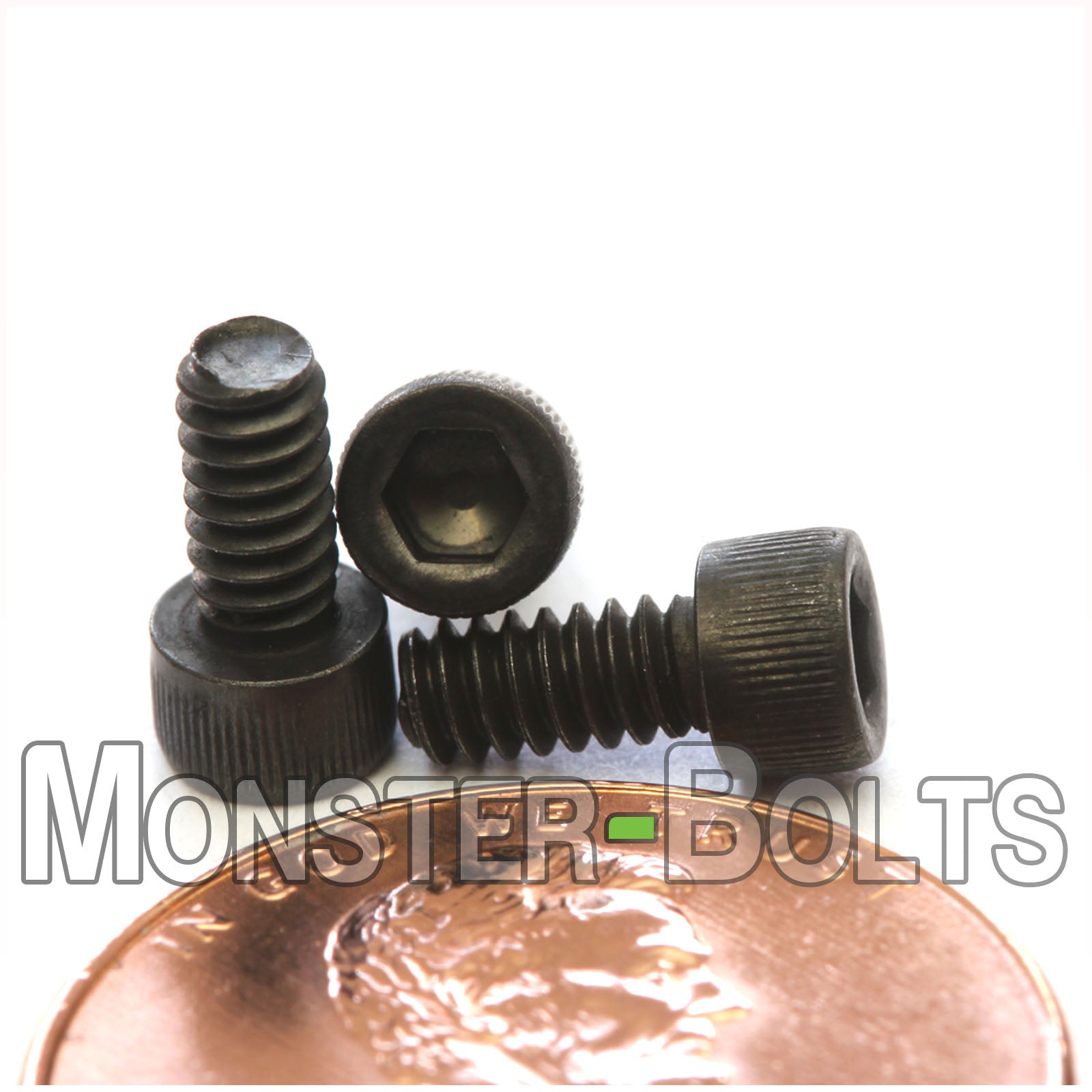 #4-40 x 1/4 inch socket head cap screw, alloy steel with black oxide finish. Shown with US penny for screw size.