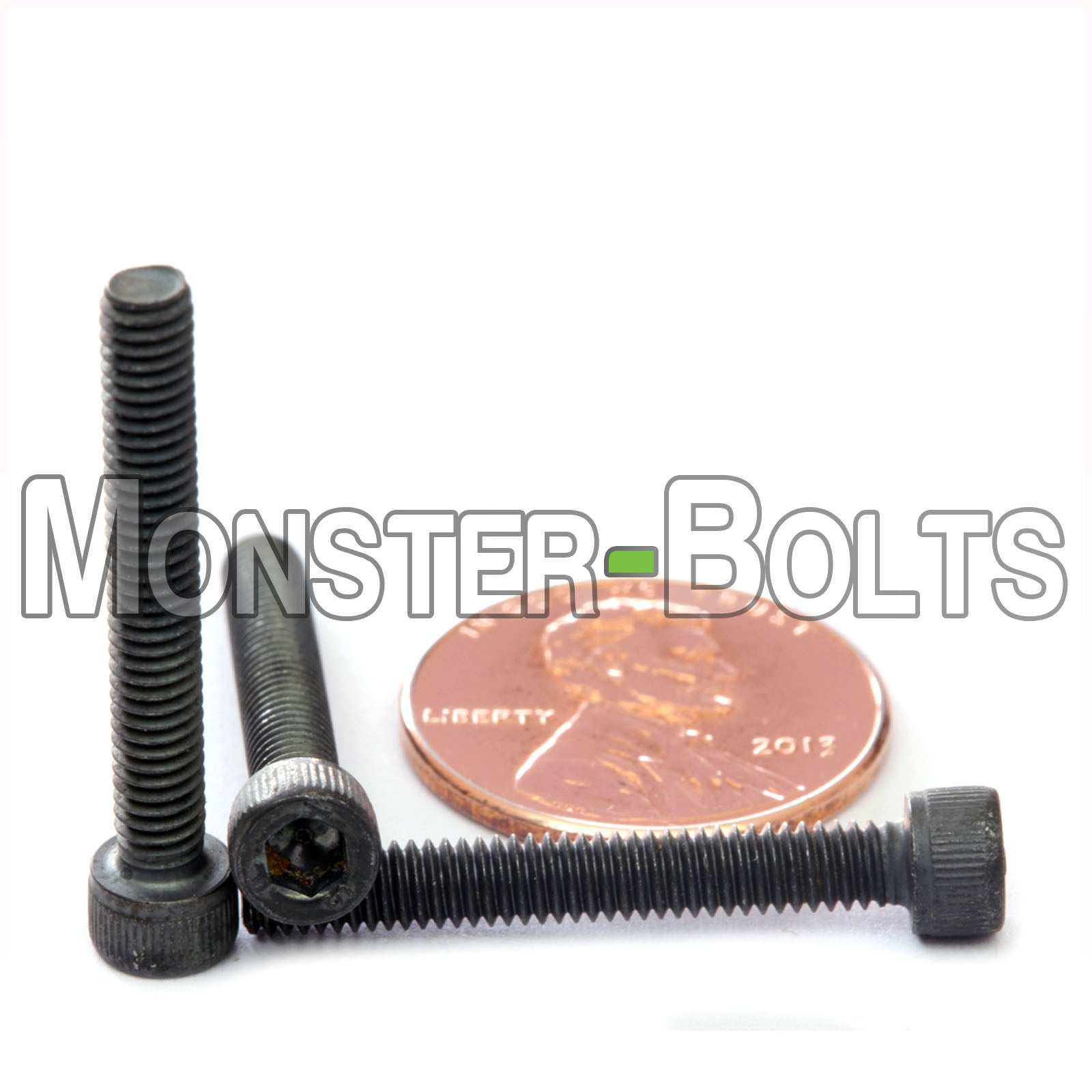 #6-40 x 1" Socket Head Cap screw, alloy steel with black oxide finish. Shown with US penny for screw size.