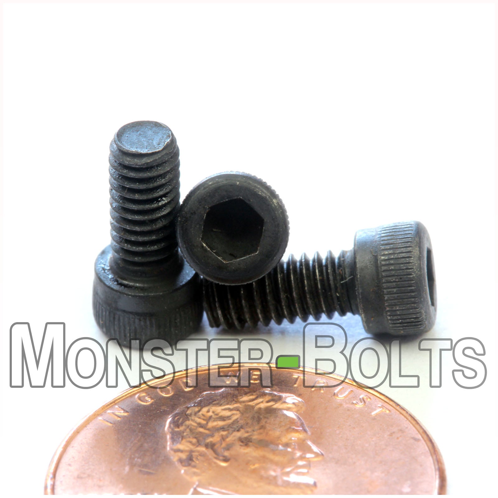 #6-40 x 5/16" Socket Cap screw, alloy steel with black oxide finish. Shown with US penny for screw size.