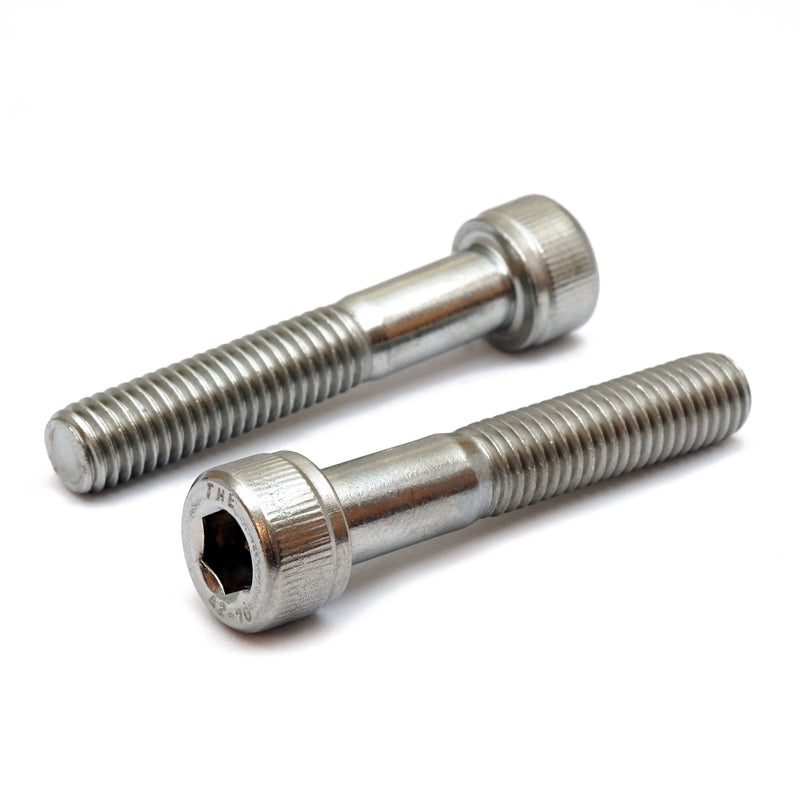 Stainless partial thread 5/16-18 Socket Head cap screws on white background.