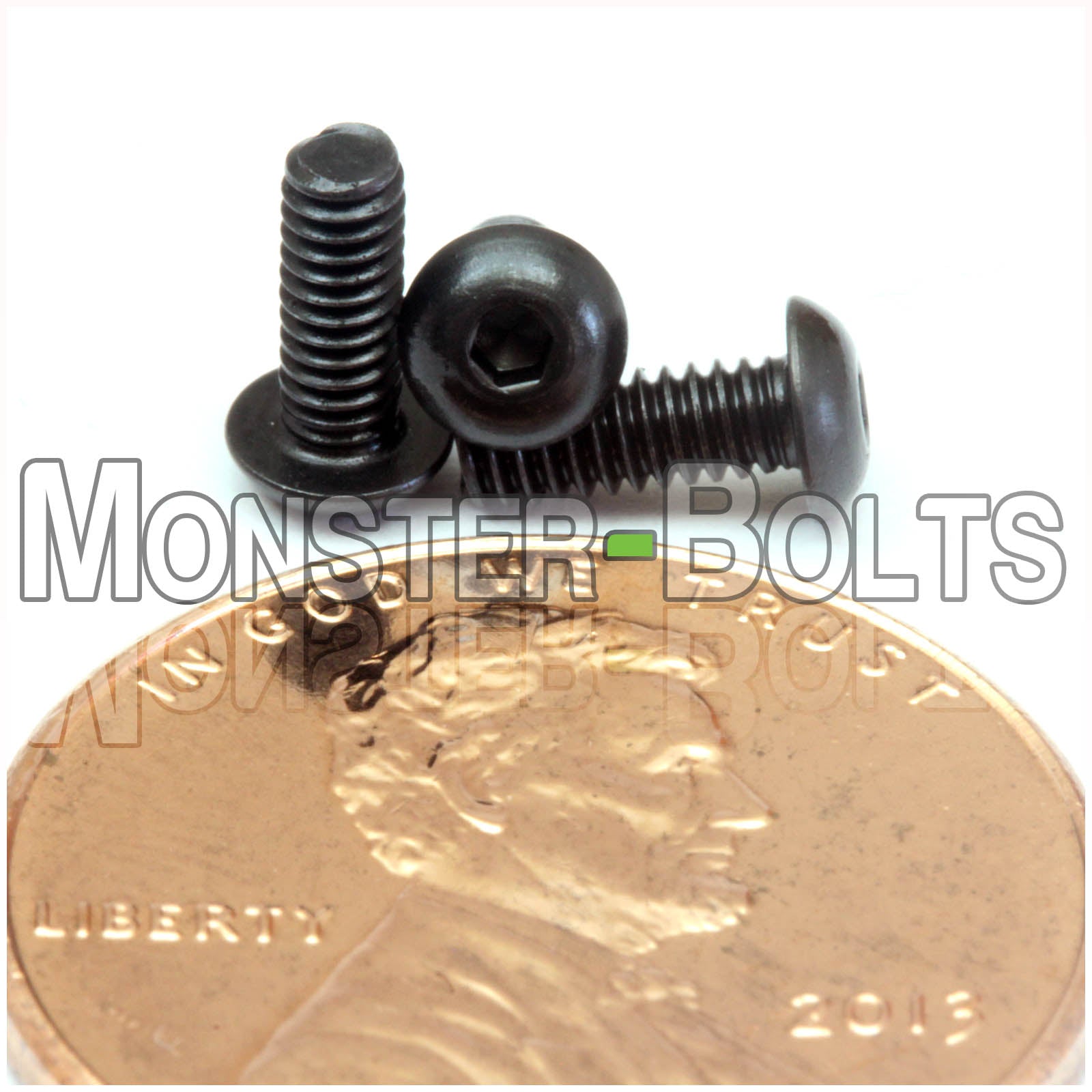 Black #2-56 x 1/4 in. button head socket cap screws, with US penny for size.