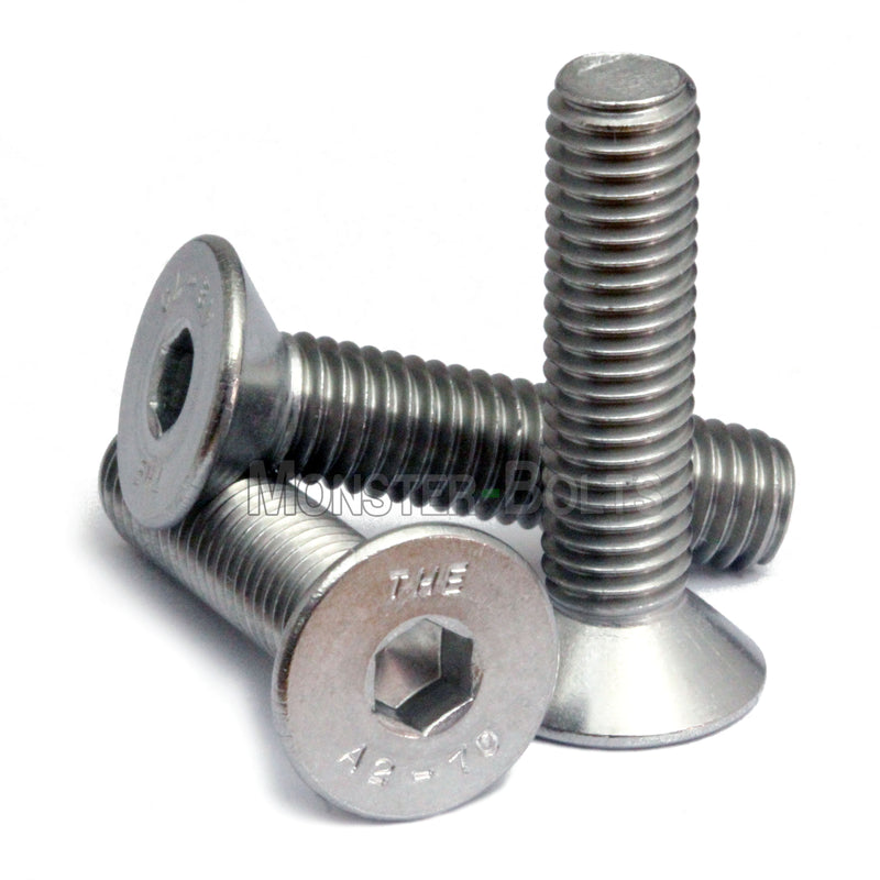 Countersunk Stainless Steel SAE 1/4-20 Flat Head cap screws stacked to show different angles on white.
