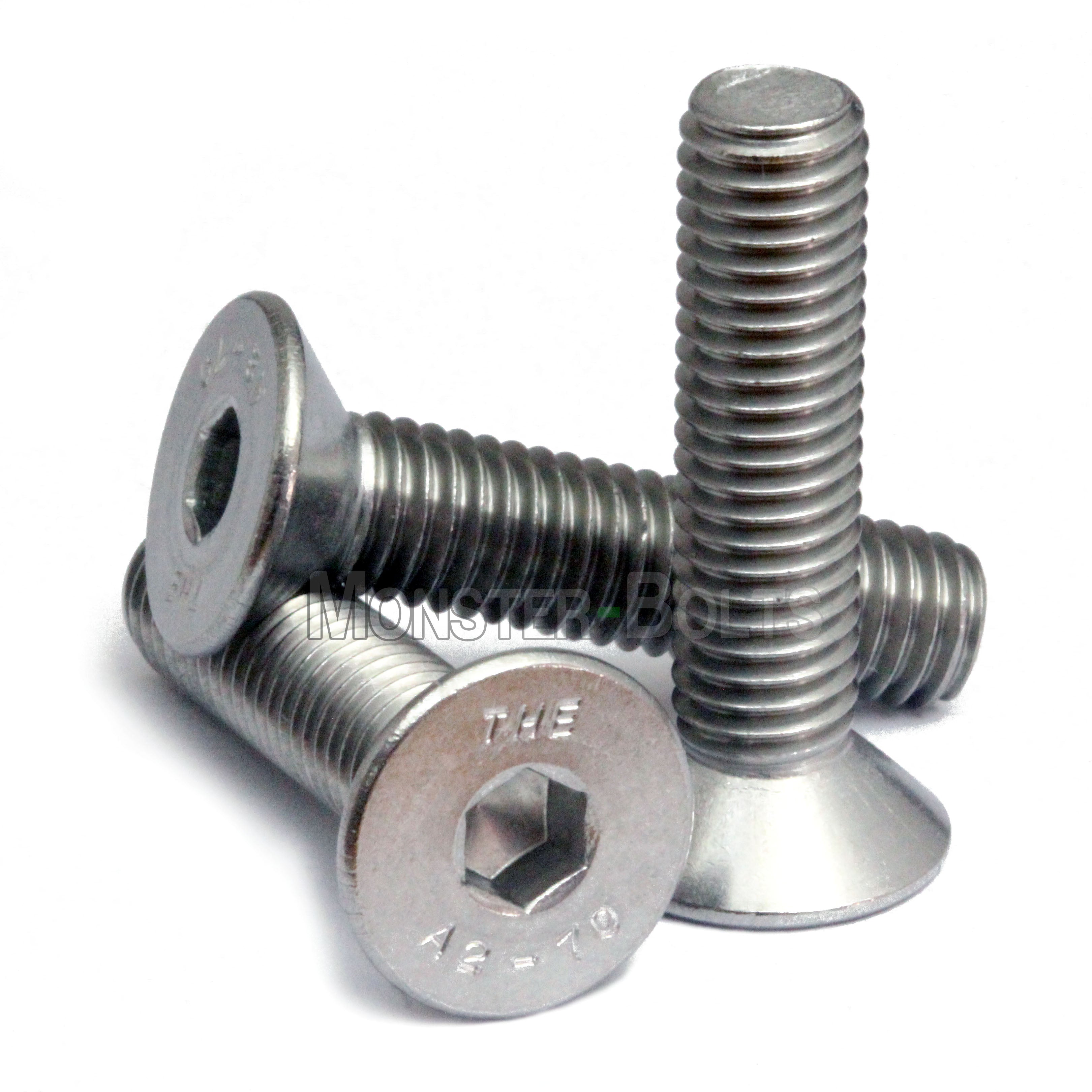 Countersunk Stainless Steel SAE #4-40 Flat Head cap screws stacked to show different angles on white.