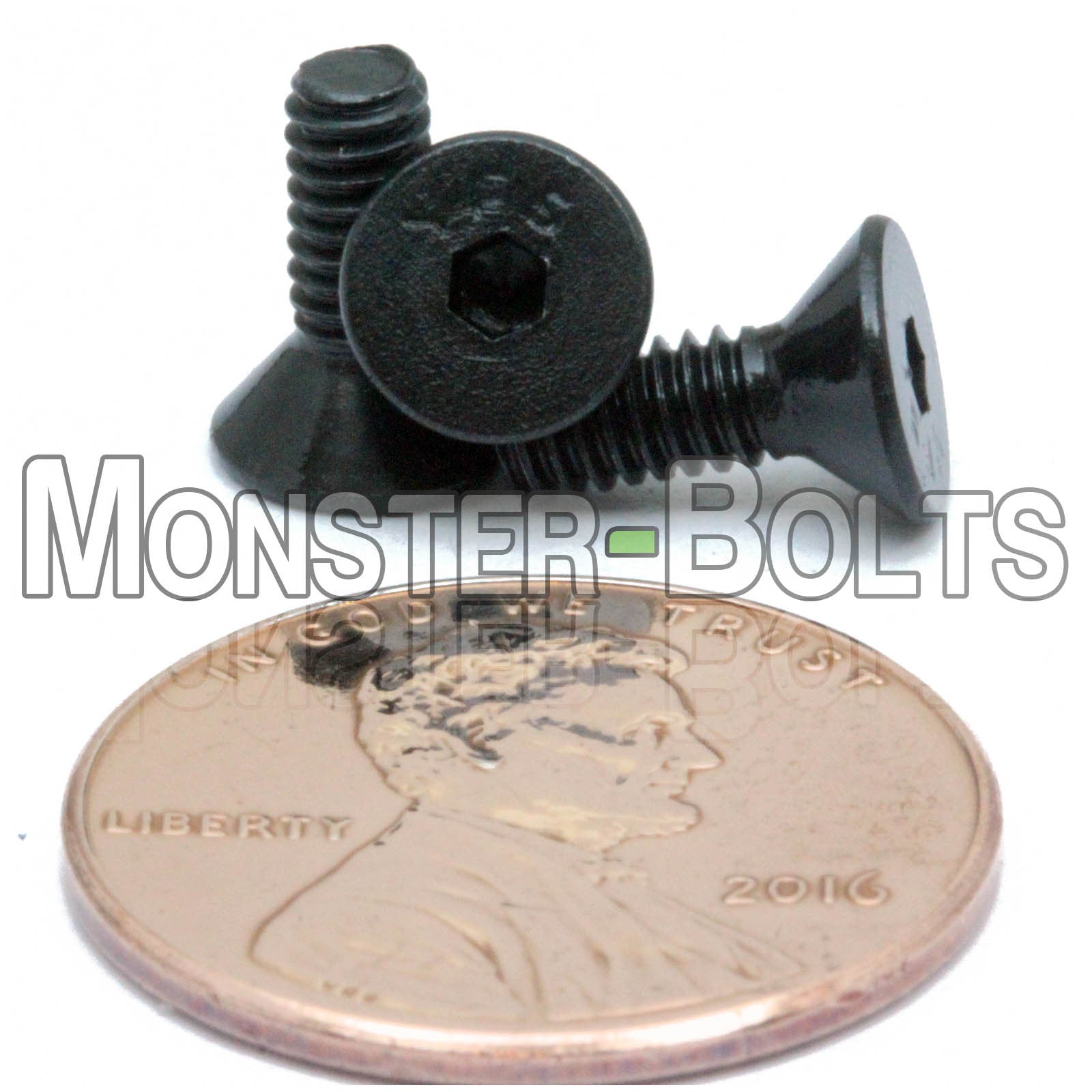 Black #5-40 x 3/8 in. socket flat head screws, with US penny for size.