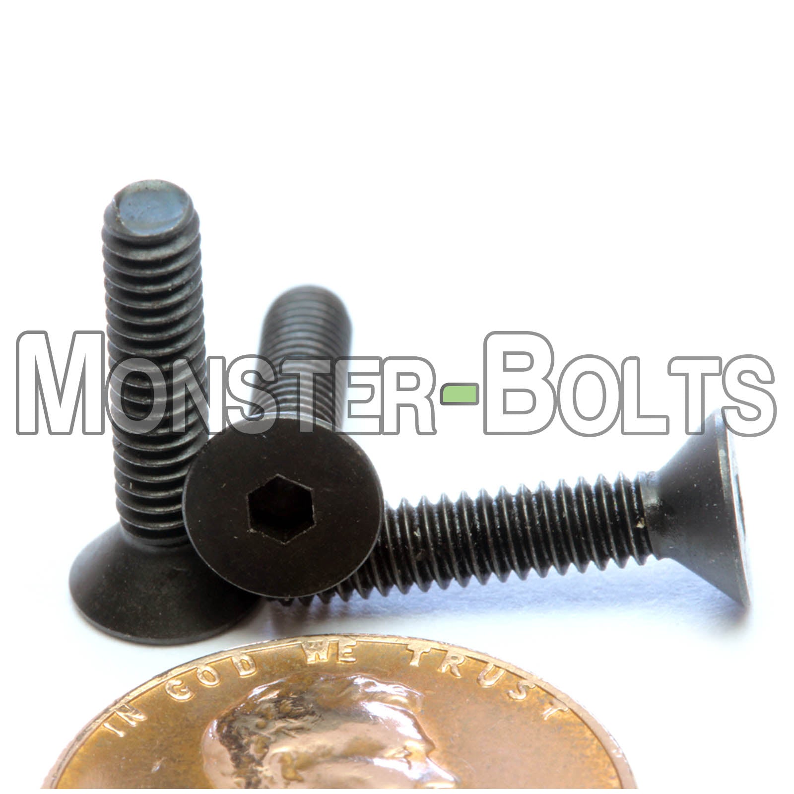 Black #5-40 x 5/8 inch flat head socket screws, with US penny for size.