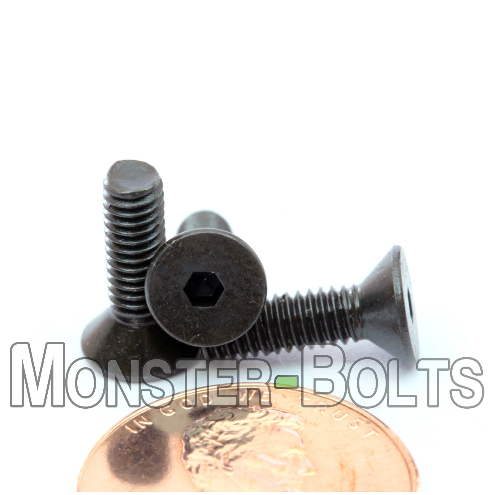 Countersunk Black #6-40 x 1/2" flat head socket screws, with US penny for size.