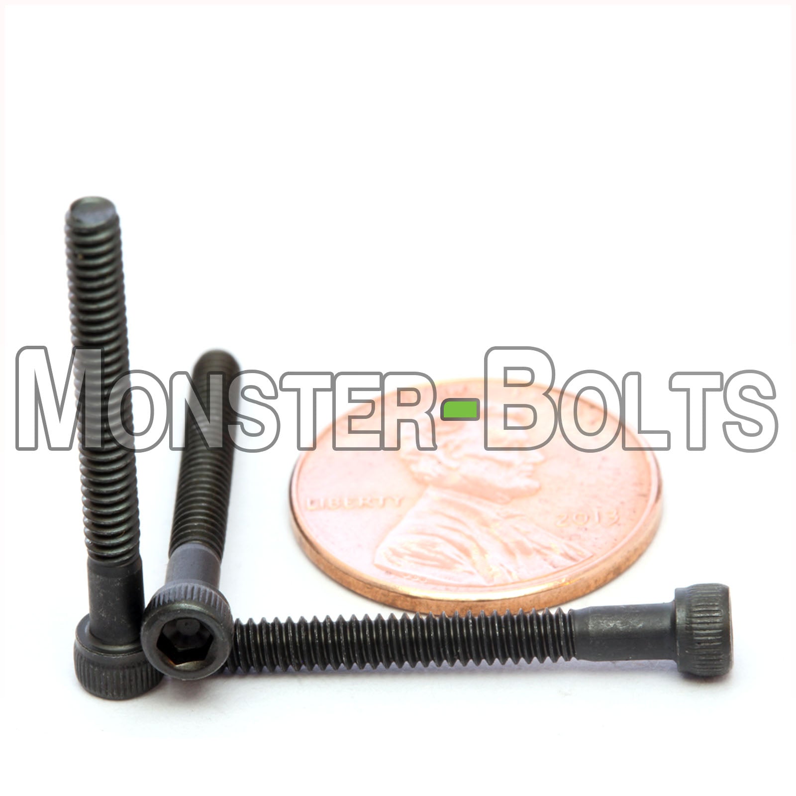 #4-40 x 1" Socket Head Cap screw, alloy steel with black oxide finish. Shown with US penny for screw size.