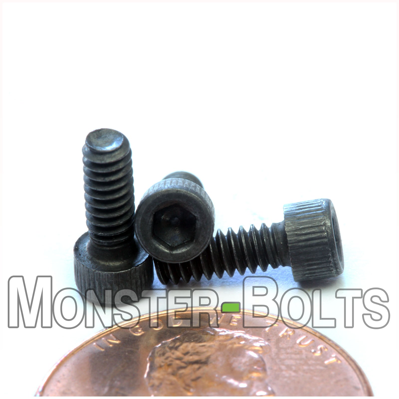 #4-40 x 5/16" Socket Cap screw, alloy steel with black oxide finish. Shown with US penny for screw size.