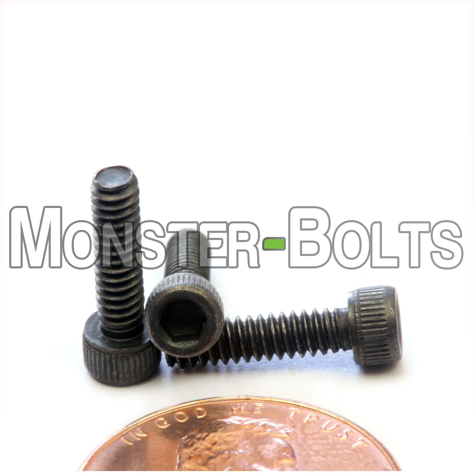 #4-40 x 7/16" Socket Head Cap screw, alloy steel with black oxide finish. Shown with US penny for screw size.