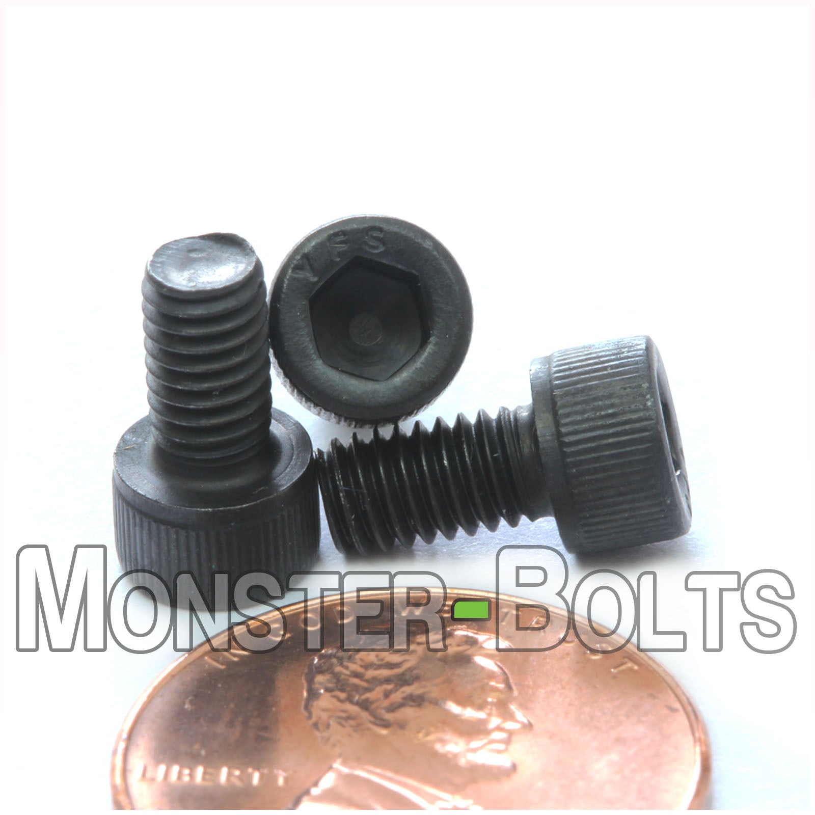 #8-32 x 5/16" Socket Cap screw, alloy steel with black oxide finish. Shown with US penny for screw size.