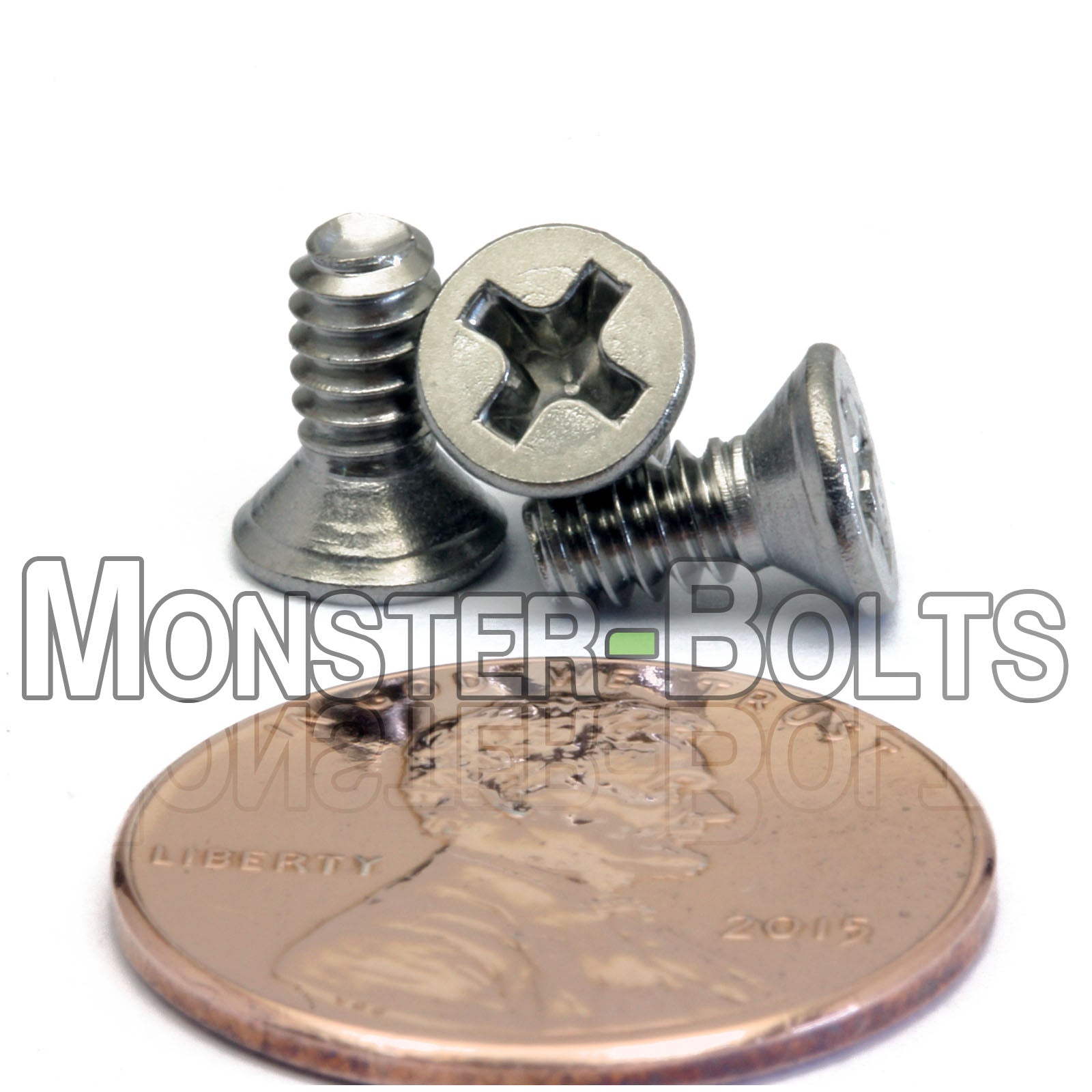 #6-32 x 5/16" Stainless Steel Phillips Flat Head screws shown with US penny for scale