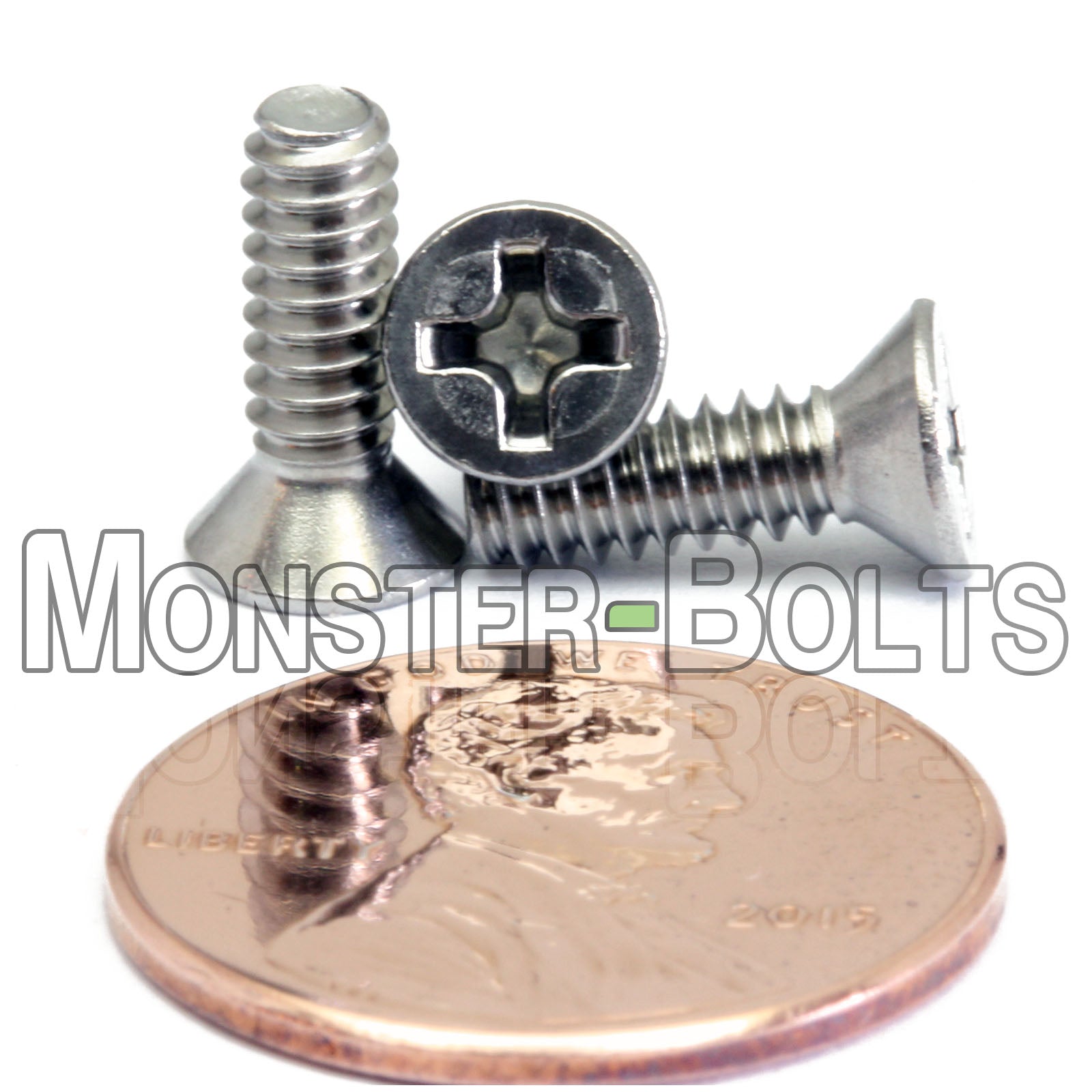 #6-32 x 7/16" Stainless Steel countersunk Phillips Flat Head screws shown with US penny for scale