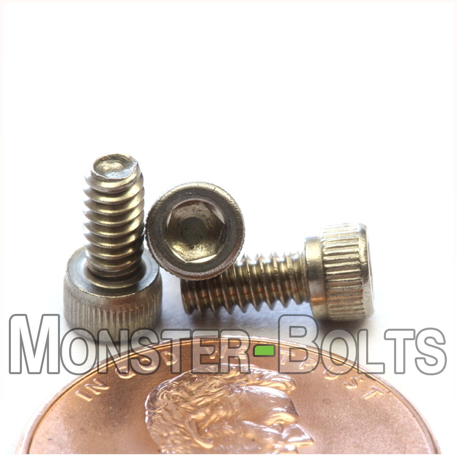 Stainless #4-40 x 1/4 in. Socket Head cap screws, with US penny for size.