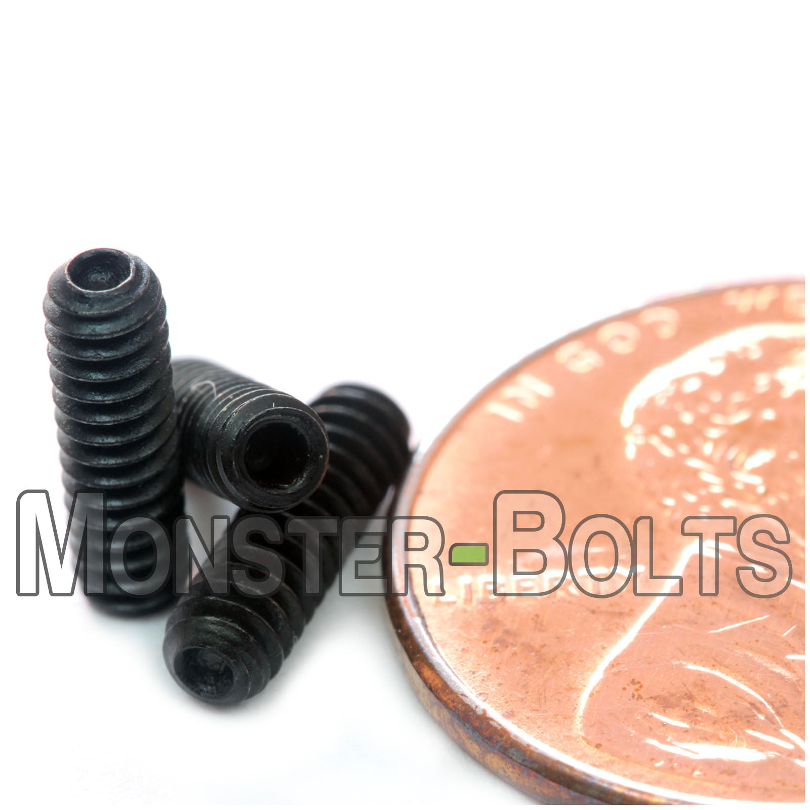 Black #4-40 x 3/8" Allen key set screws with cup point.